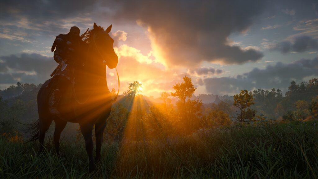 Ein Mann reitet mit einem Pferd in den Sonnenuntergang