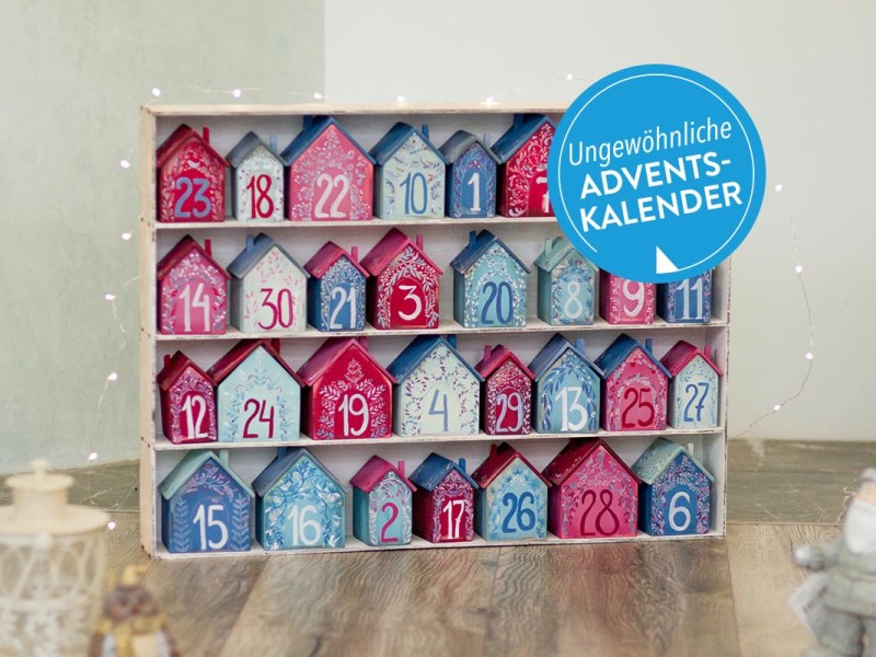 Adventskalender auf dem Boden stehend