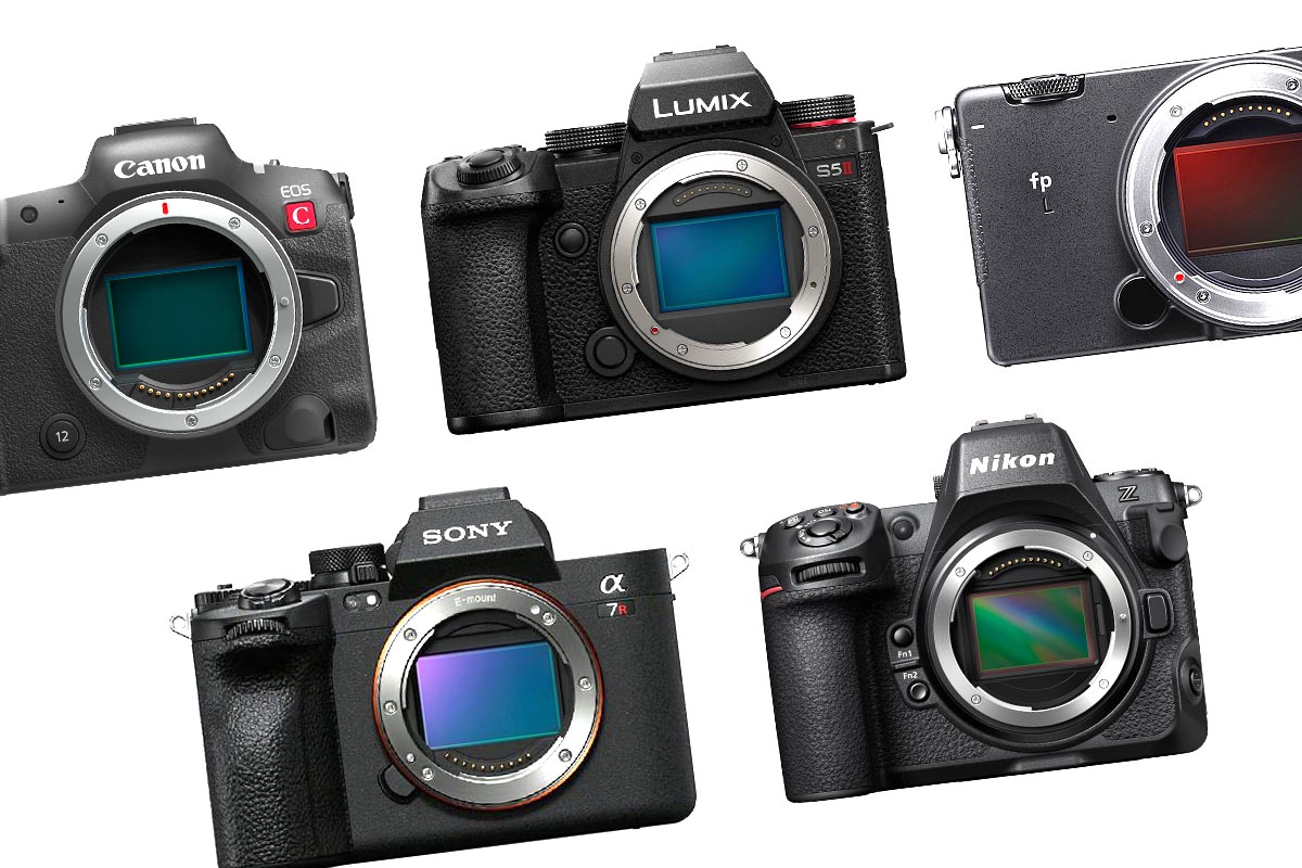 Fünf Kameras verschiedener Hersteller auf weißem Grund.