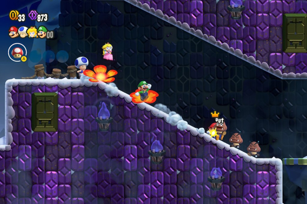 Screenshot aus dem Spiel Super Mario Bros. Wonder. Man sieht den Mehrspieler-Modus, wo vier Charaktere durch ein unterirdisches Level laufen.