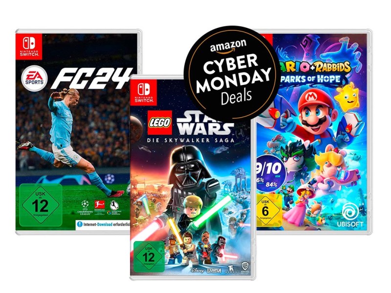 Drei Nintendo Switch-Spiele in Reihe: Links FC24, in der Mitte Lego Star Wars, rechts Super Mario auf weißem Hintergrund mit schwarzem Button rechts oben "Amazon Cyber Monday Deals"