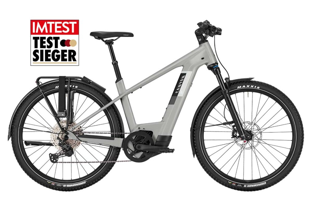 Productshot graues E-Bike von der Seite mit Testsieger-Grafik