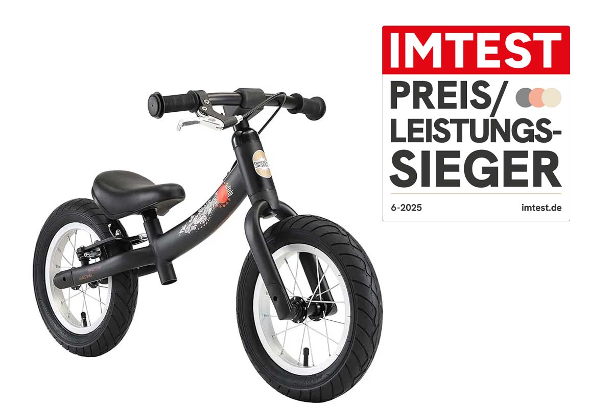 schwarzes Laufrad auf weißem Grund, dazu Testsieger Grafik