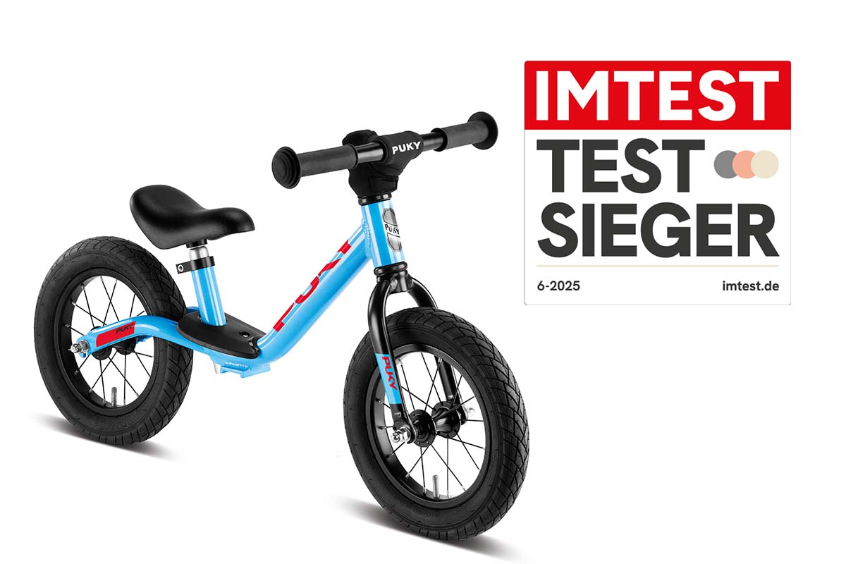 blaues Kinderlaufrad mit Testsieger-Siegel
